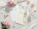 Two 'Advice for the bride-to-be' cards on a marble table.