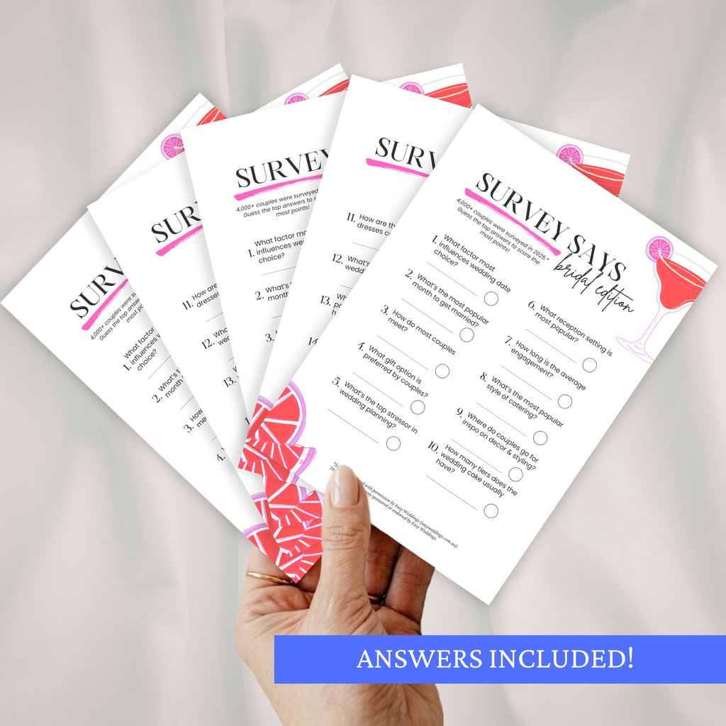 Hand holding multiple Bridal Family Feud game cards against a white background.