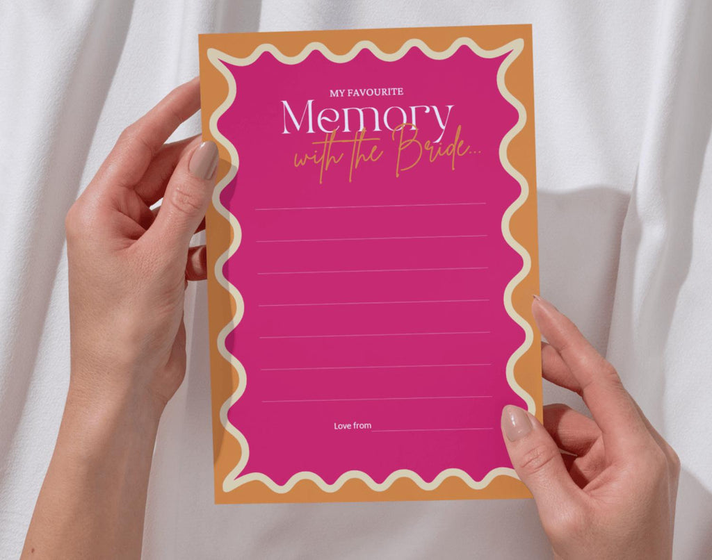 One 'Favourite Memory with the Bride' card held by two hands against a white background.