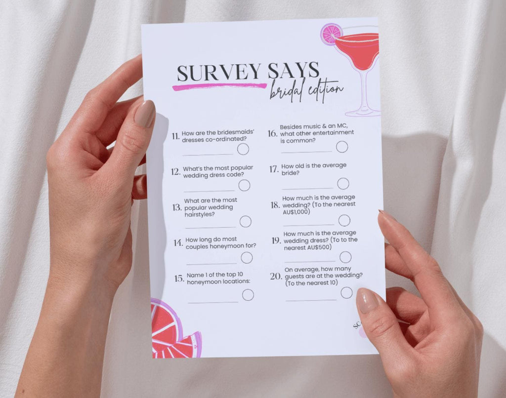 Two hands holding a Bridal Shower Family Feud party game card. 