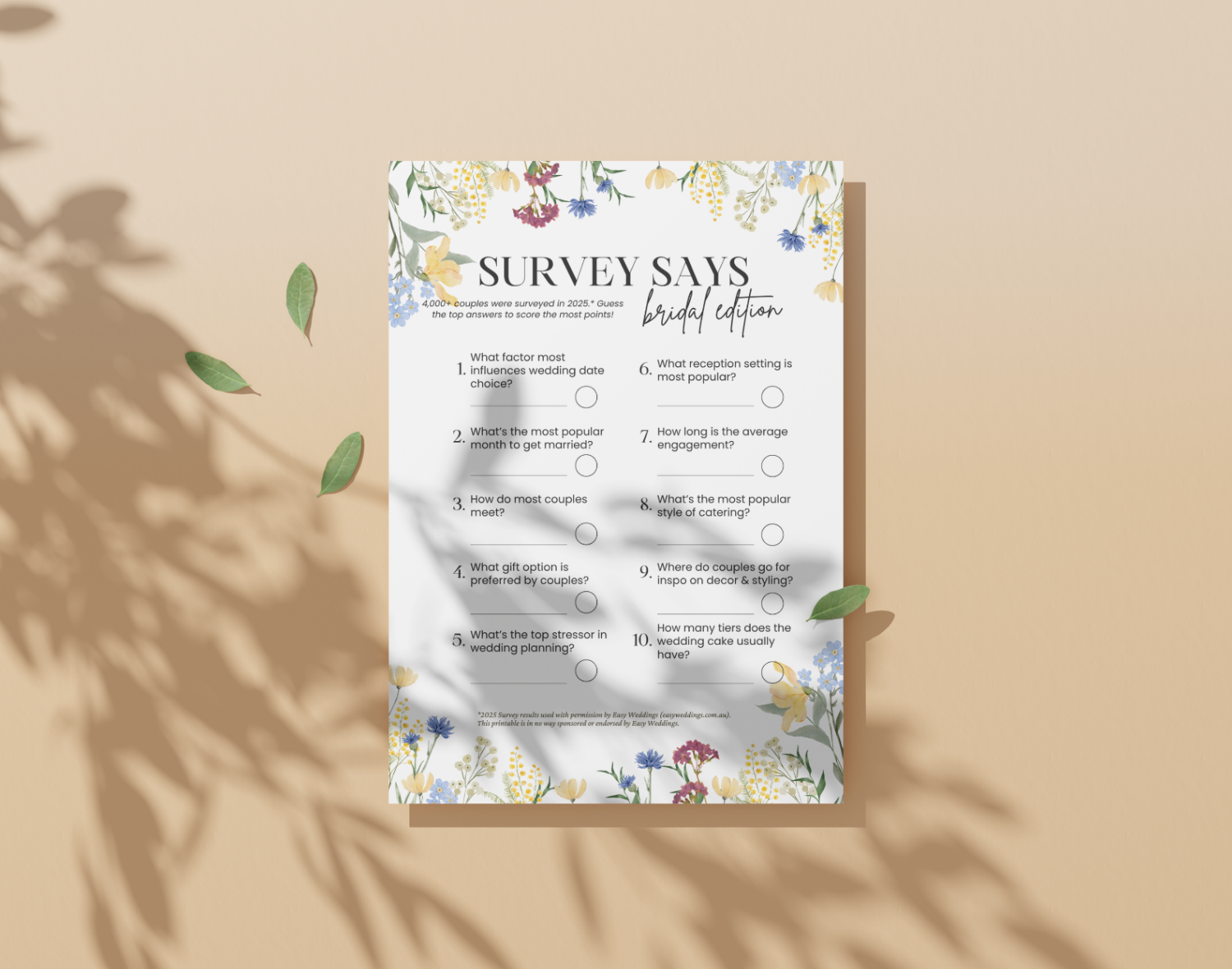 Bridal family feud game card with floral design on a beige background